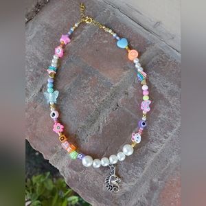 "QUEER " necklace part of the Pride collection handmade by me